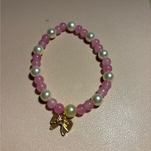 Hand Crafted Pink bow 🎀 Beaded Bracelet by me